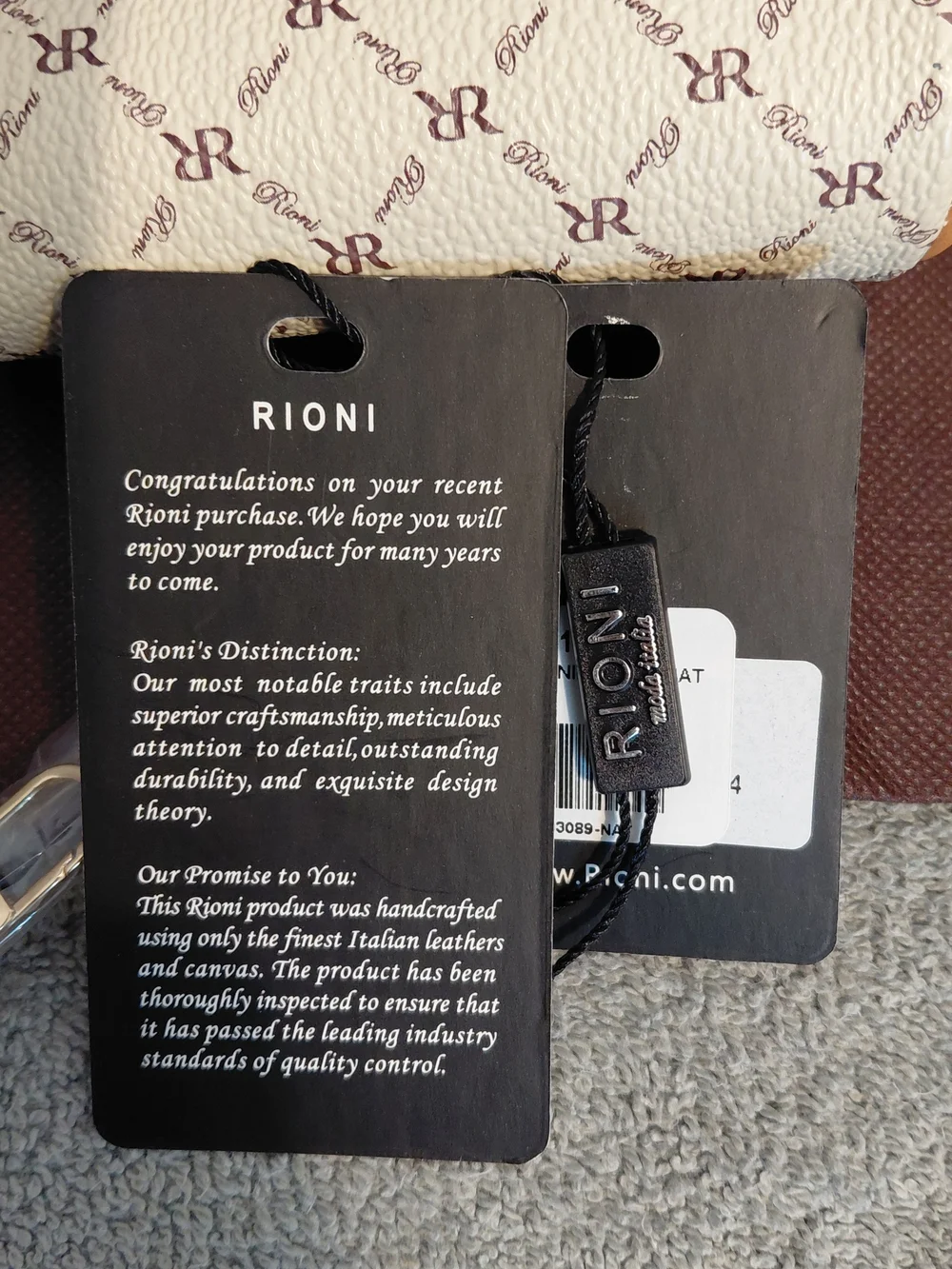 Rioni Cream Monogram Clutch with Gold Emblem